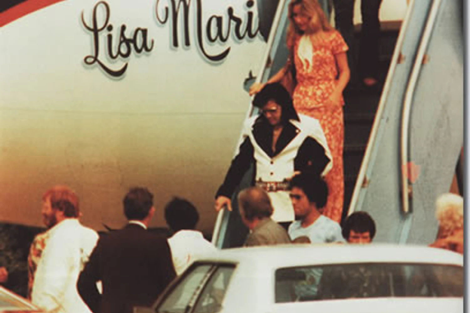 Elvis desembarcando do Lisa Marie, um Convair 880