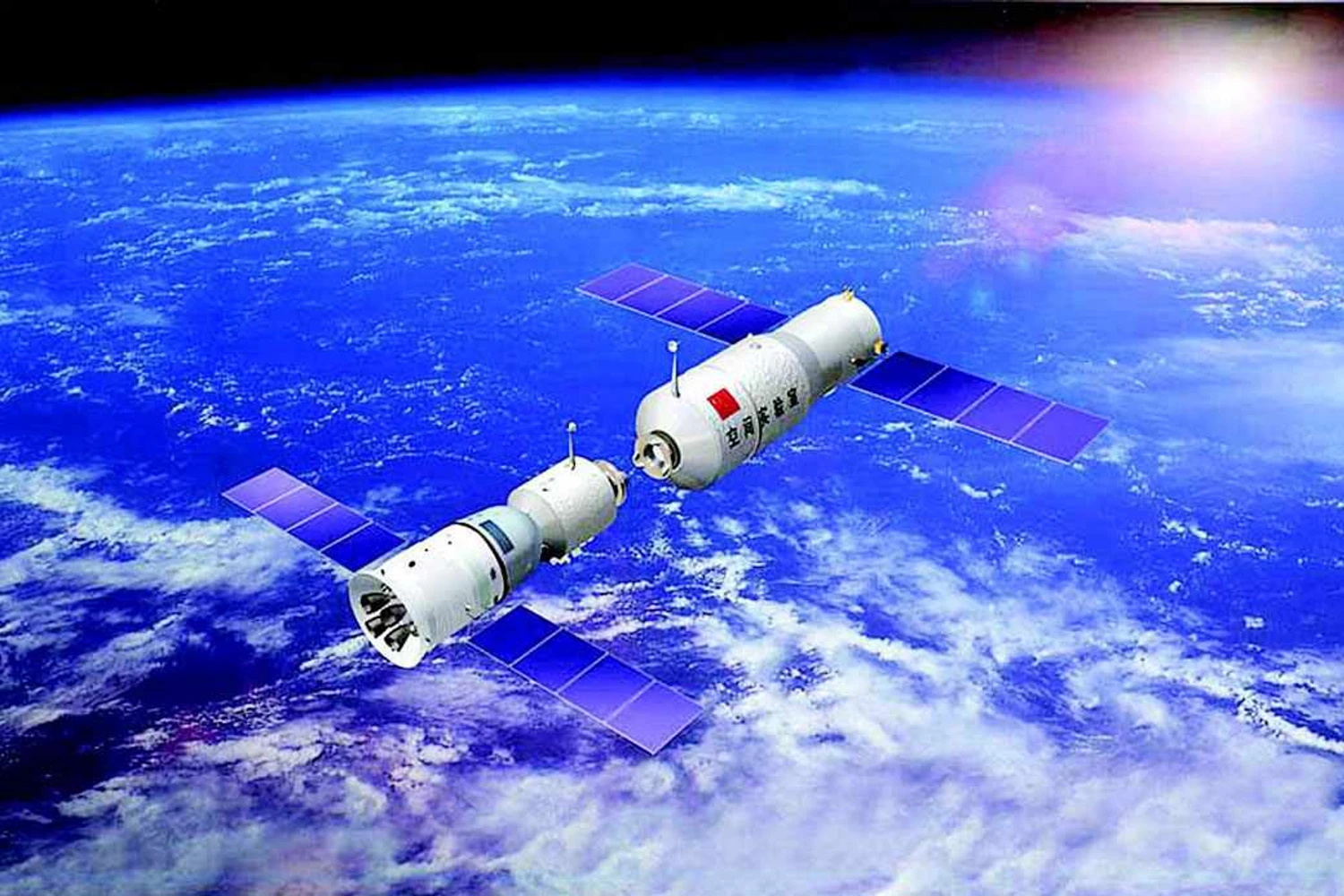 Nave Shenzhou se conecta a estação Tiangong 1 (a direita) (Imagem - Reprodução/Youtube)
