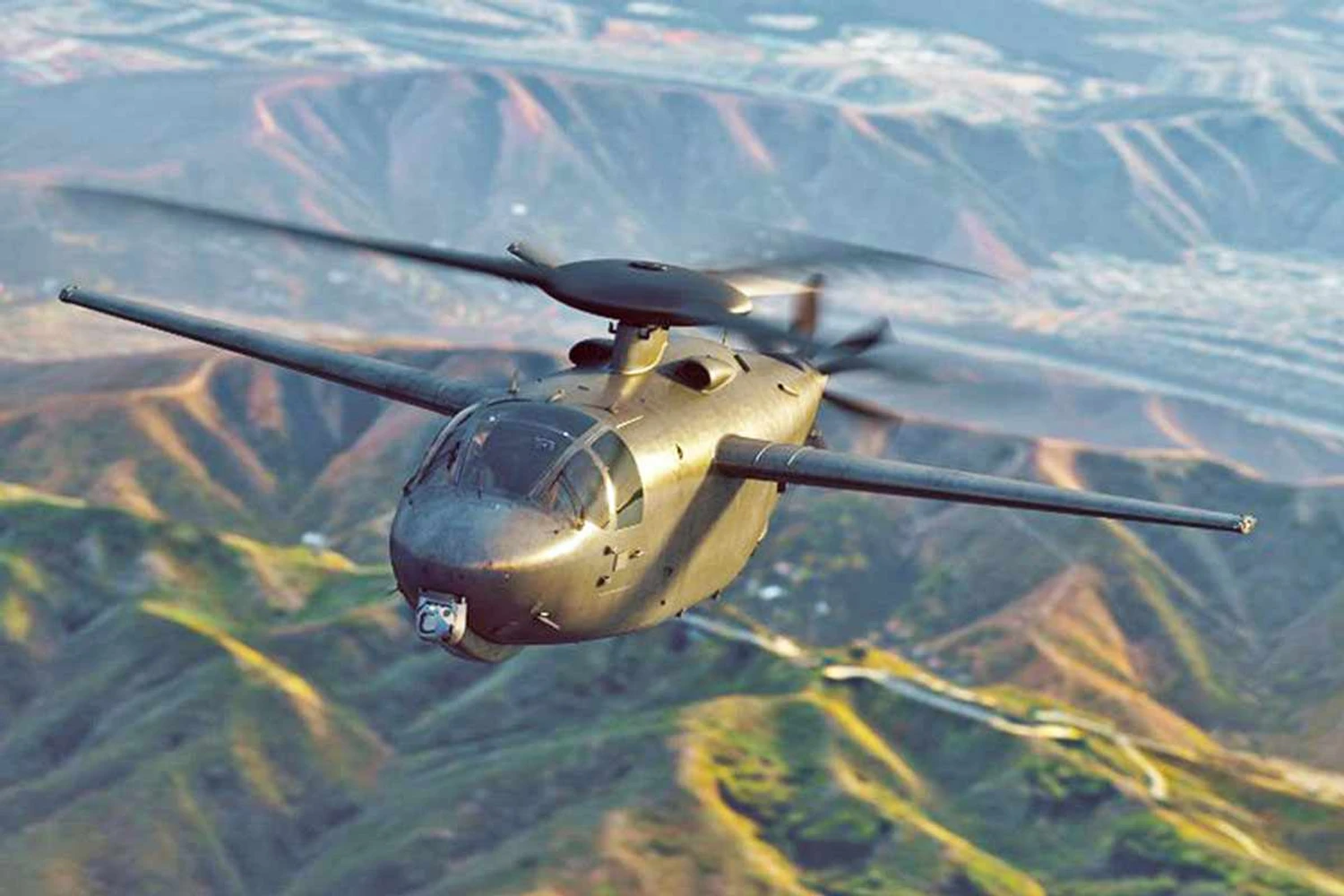 The helicopter uses a rigid main rotor and a pivotal tail rotor (Karem)