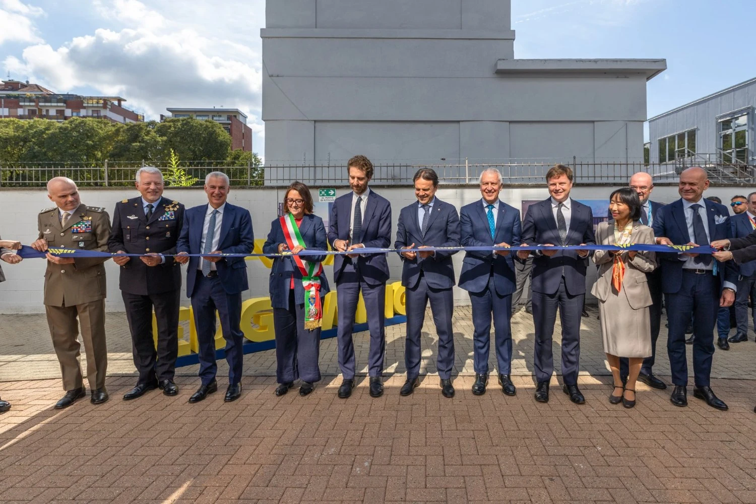 Ribbon cutting at the opening of the Edgewing office in Turin